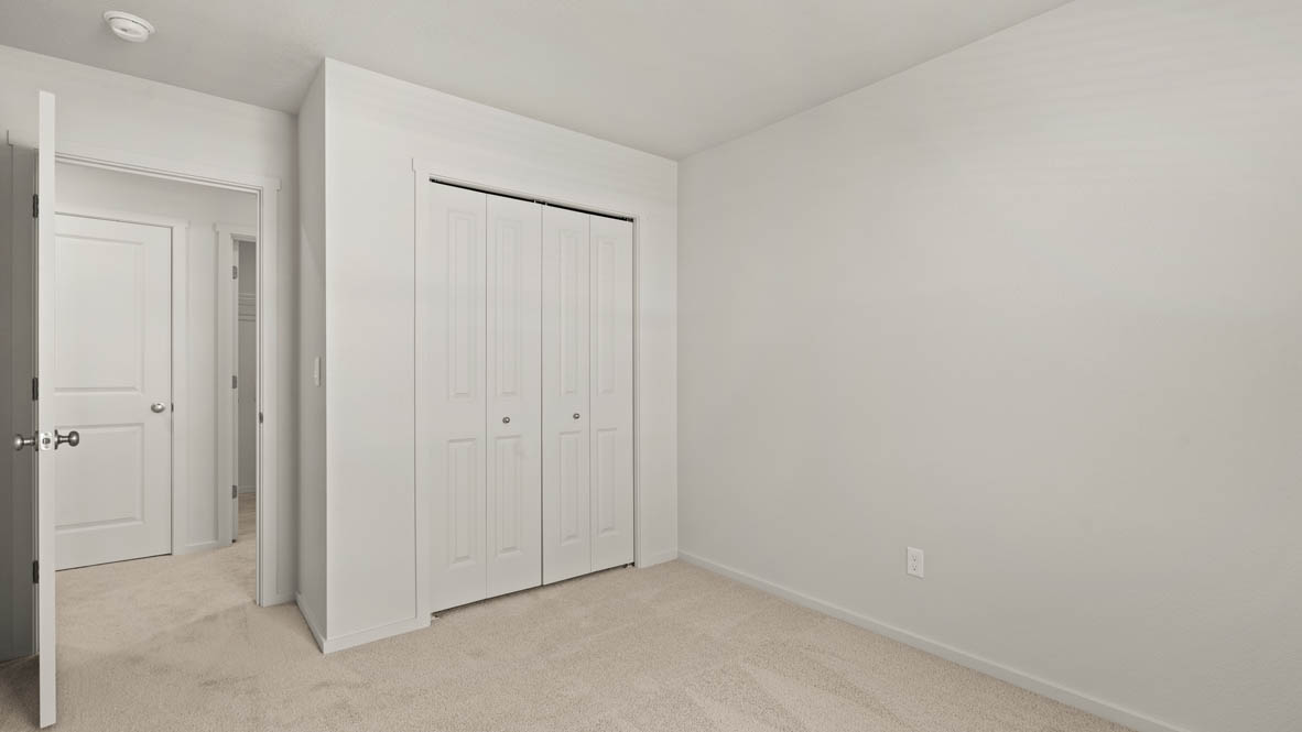 Addysen Park bedroom with carpet, window, and white walls