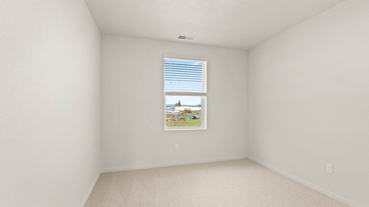 Addysen Park bedroom with carpet, window, and white walls