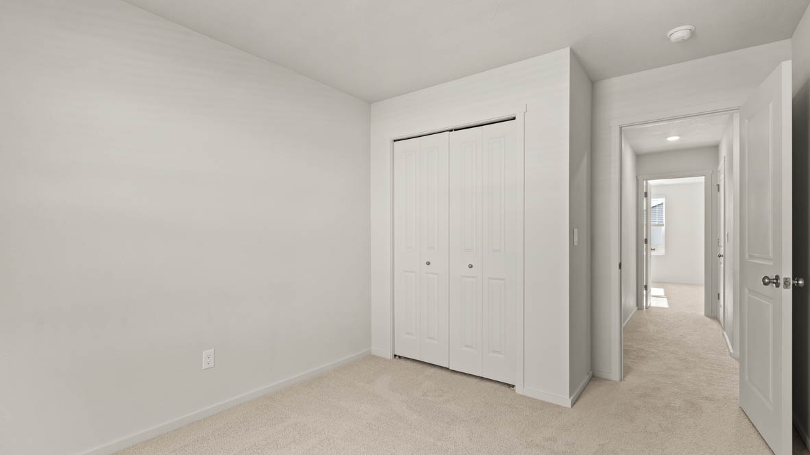 Addysen Park bedroom with carpet, window, and white walls