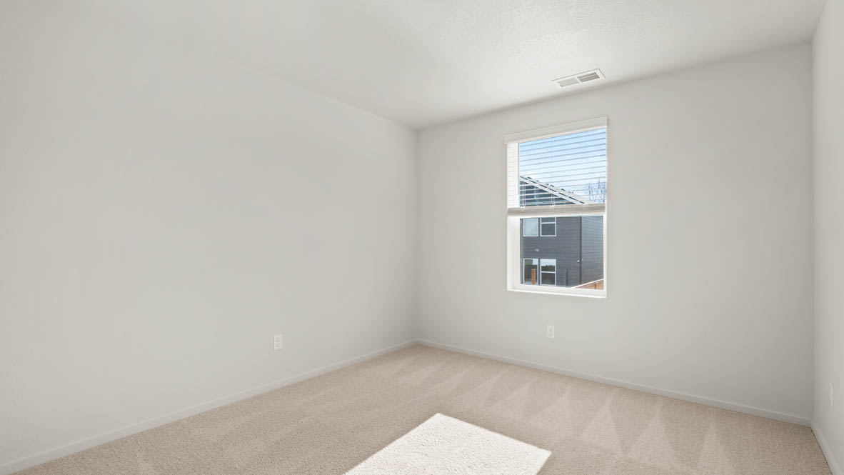 Addysen Park bedroom with carpet, window, and white walls