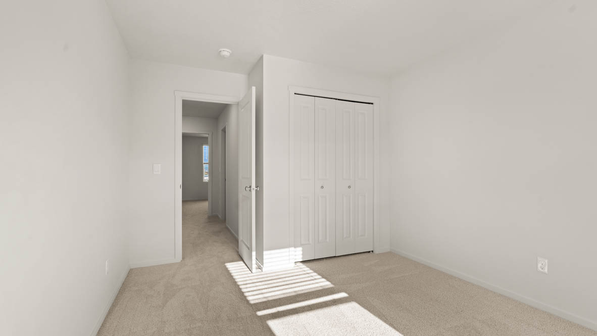 Addysen Park bedroom with carpet, window, and white walls