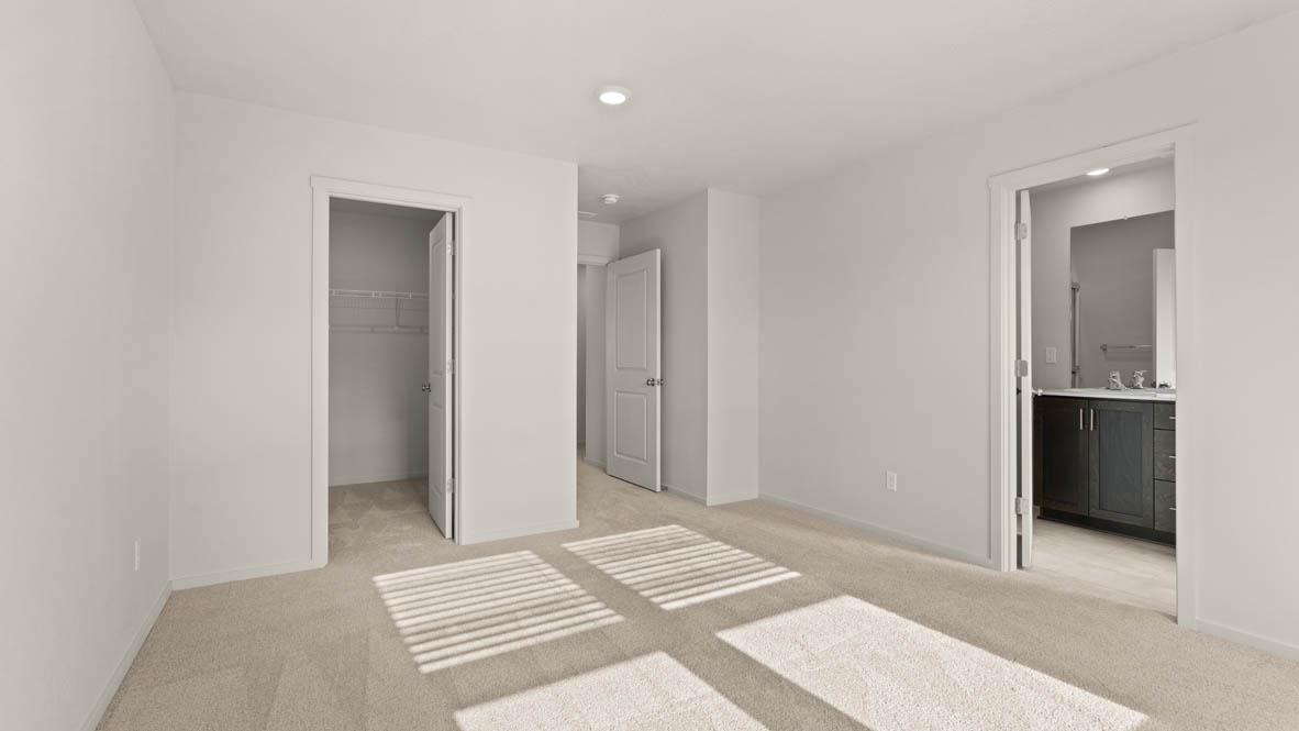 Addysen Park bedroom with carpet, window, and white walls