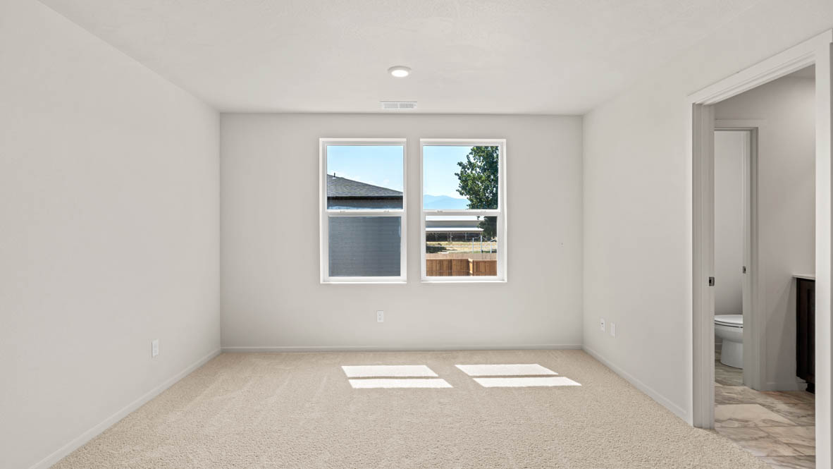 Addysen Park primary bedroom with carpet, window, and white walls