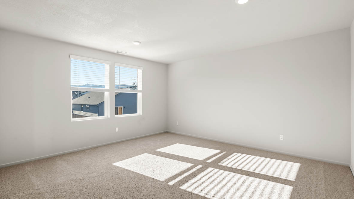 Addysen Park Primary Bedroom with carpet, white walls, and window