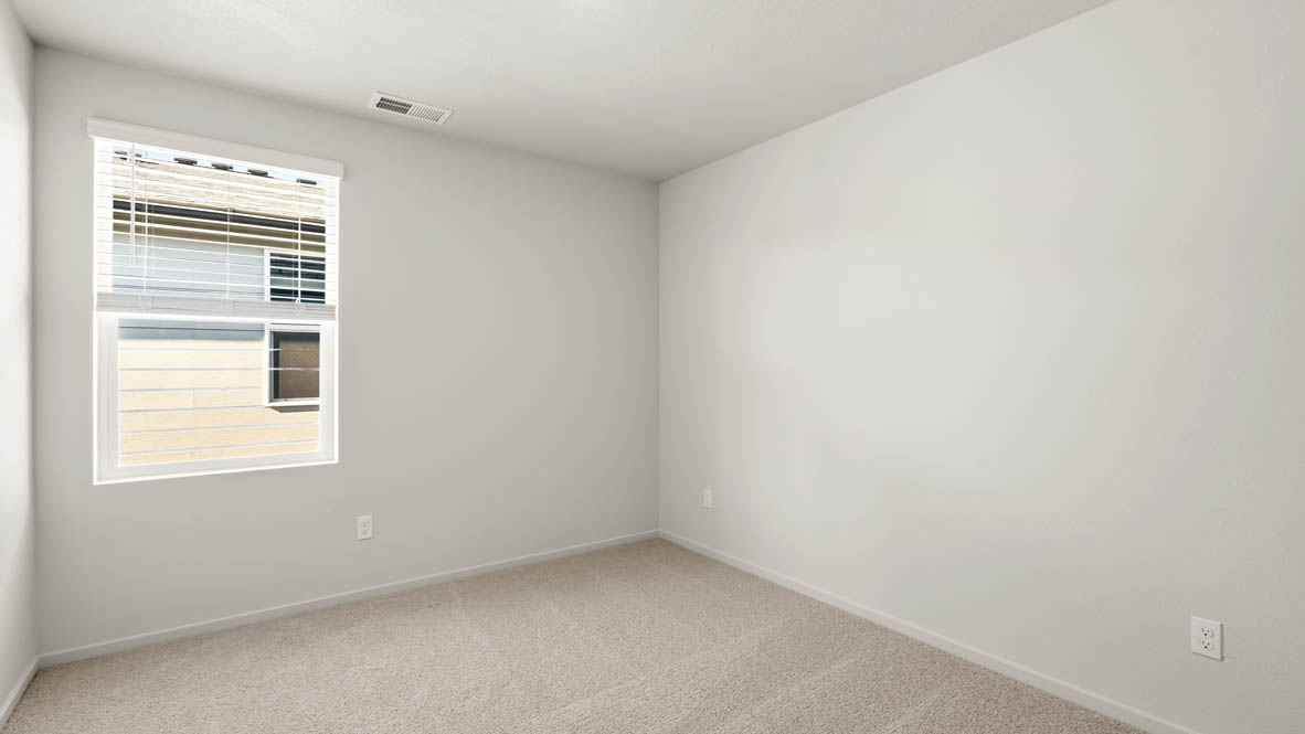 Addysen Park Bedroom with carpet, white walls, and window