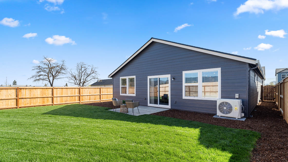 addysen park backyard with wood fencing and grass