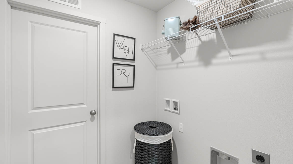 Addysen Park laundry room with white wire shelving