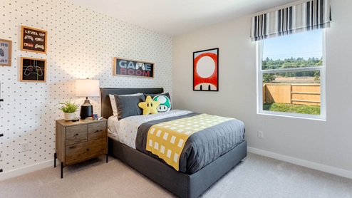 Avery Terrace Video game themed bedroom with a twin sized bed and carpeting