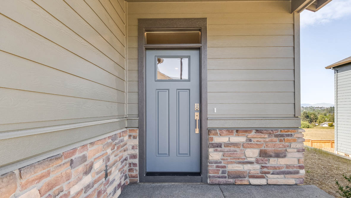 Avery Terrace Entry with a blue door