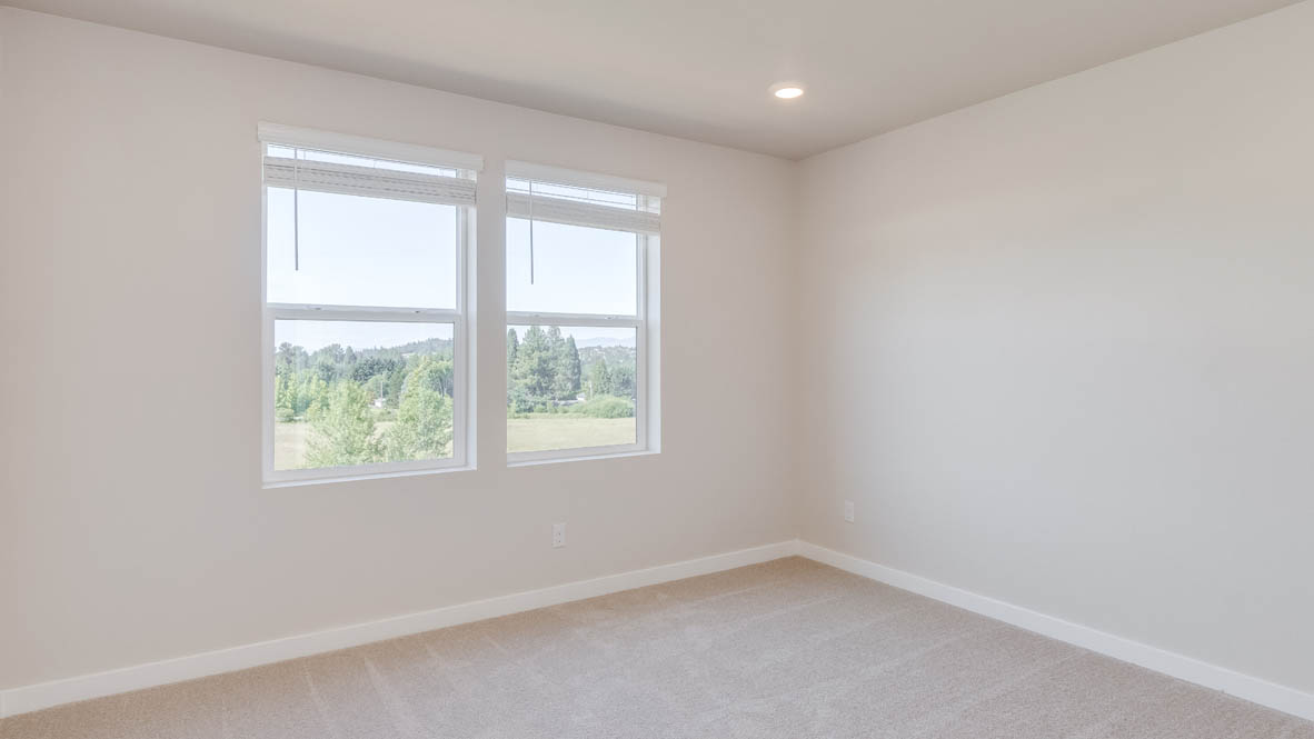 Avery Terrace Primary bedroom with carpet, windows, and white walls