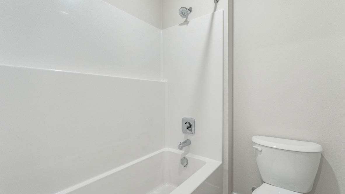Avery Terrace secondary bathroom with shower tub, and toilet
