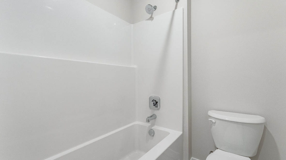Avery Terrace secondary bathroom with shower tub, and toilet
