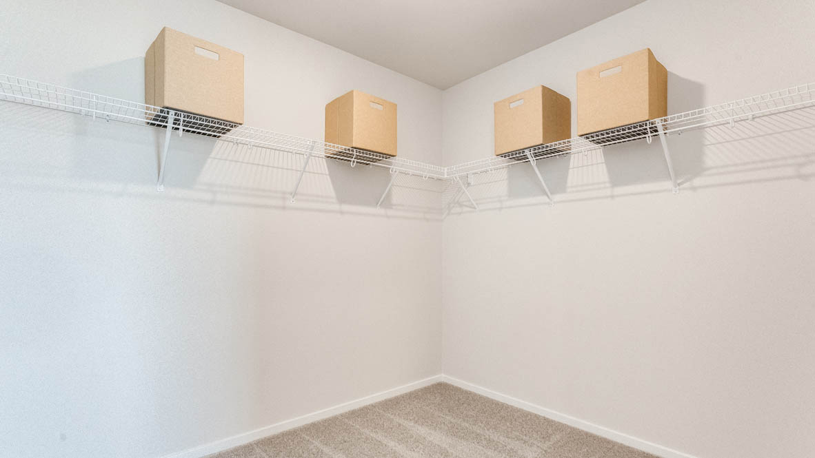 Avery Terrace Walk in closet with white wire shelving