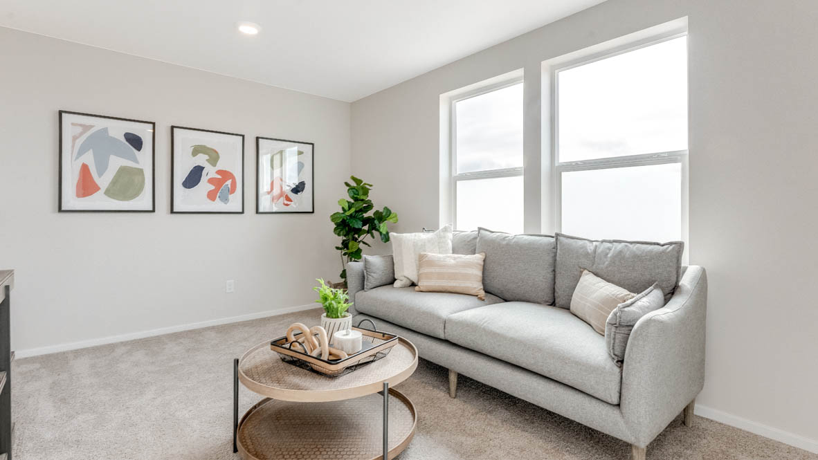 Avery Terrace Bedroom with couch, coffee table, carpeted flooring, windows with drapes