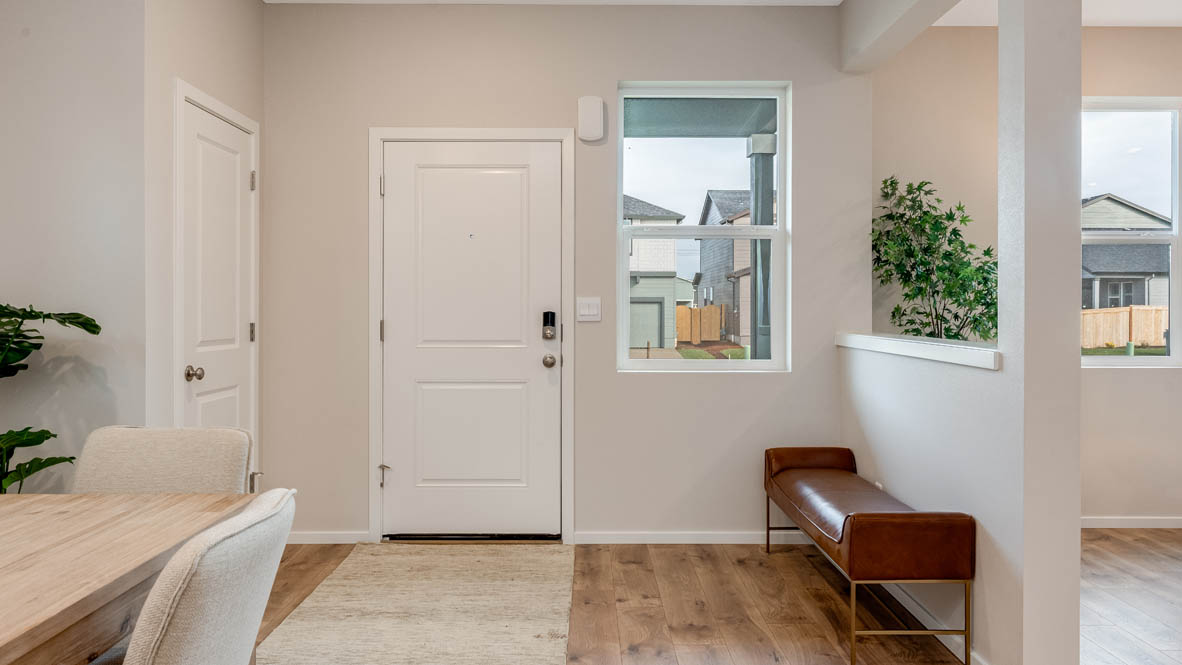 Avery Terrace Entry way with runner, entry window, dining area, dining table