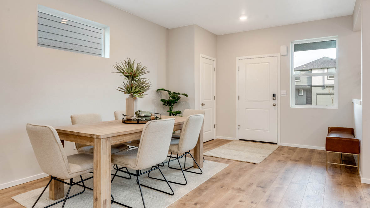 Avery Terrace Entry way with runner, entry window, dining area, dining table