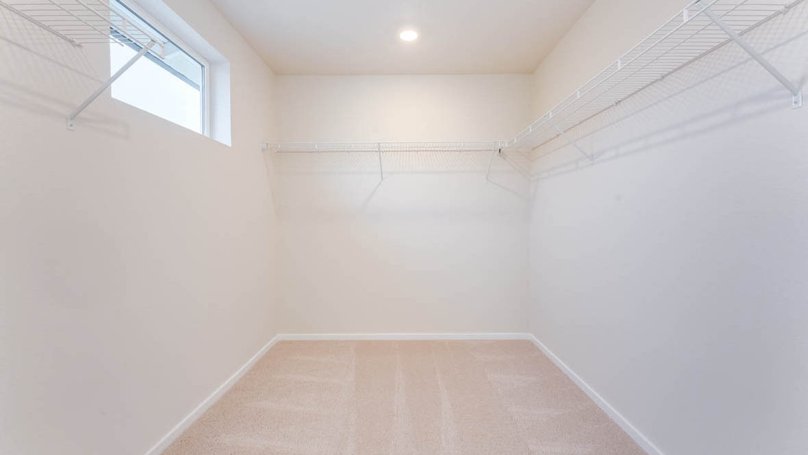Avery Terrace Walk In Closet with white wire shelving