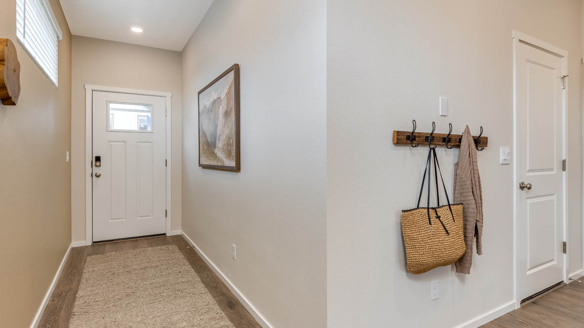 Avery terrace entry with carpet and painting, coat rack