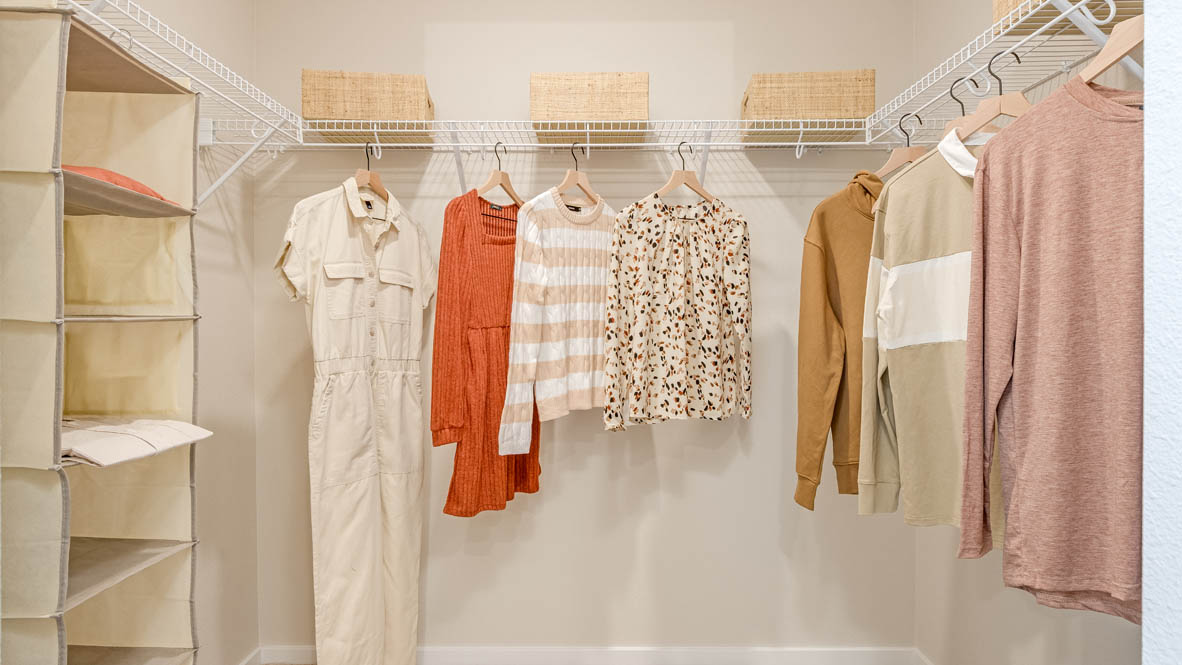 Avery Terrace walk in closet with white wire shelving