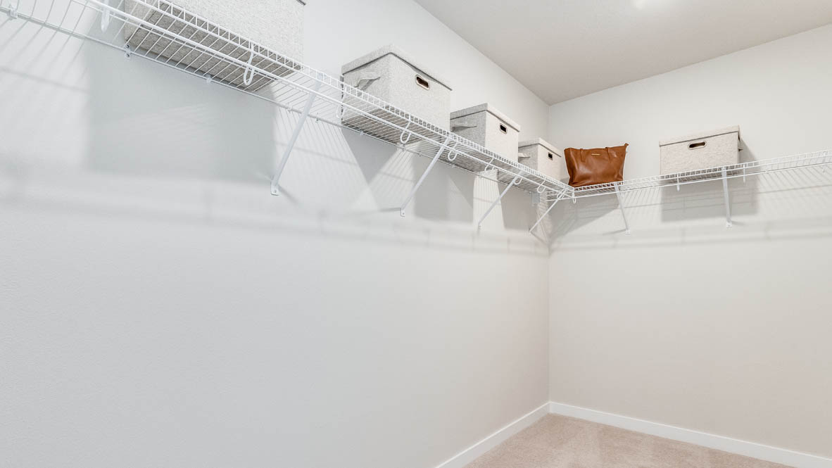 Gordon Creek Pointe walk in closet with white wire shelving