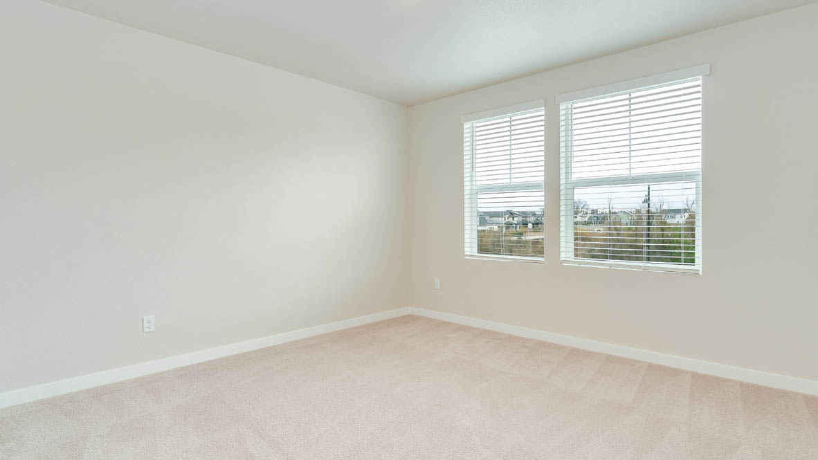 Gordon Creek Pointe bedroom with carpet, windows