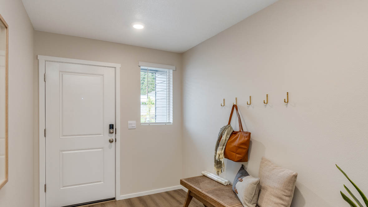 Blue Pearl Entryway with bench seat and coat hooks