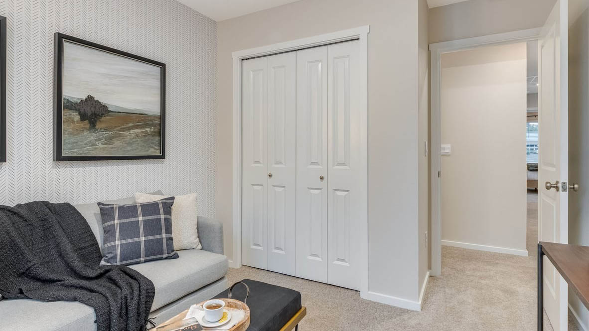 Blue Pearl Bedroom with a bed, carpet, and closet