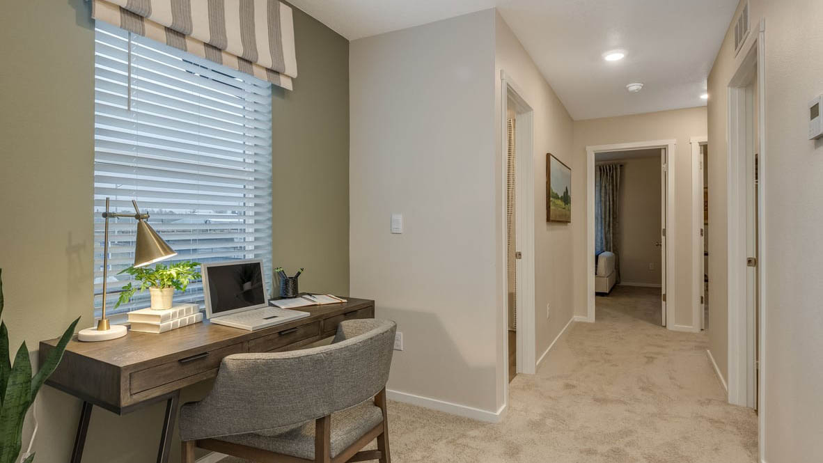 Blue pearl tech niche with desk and window