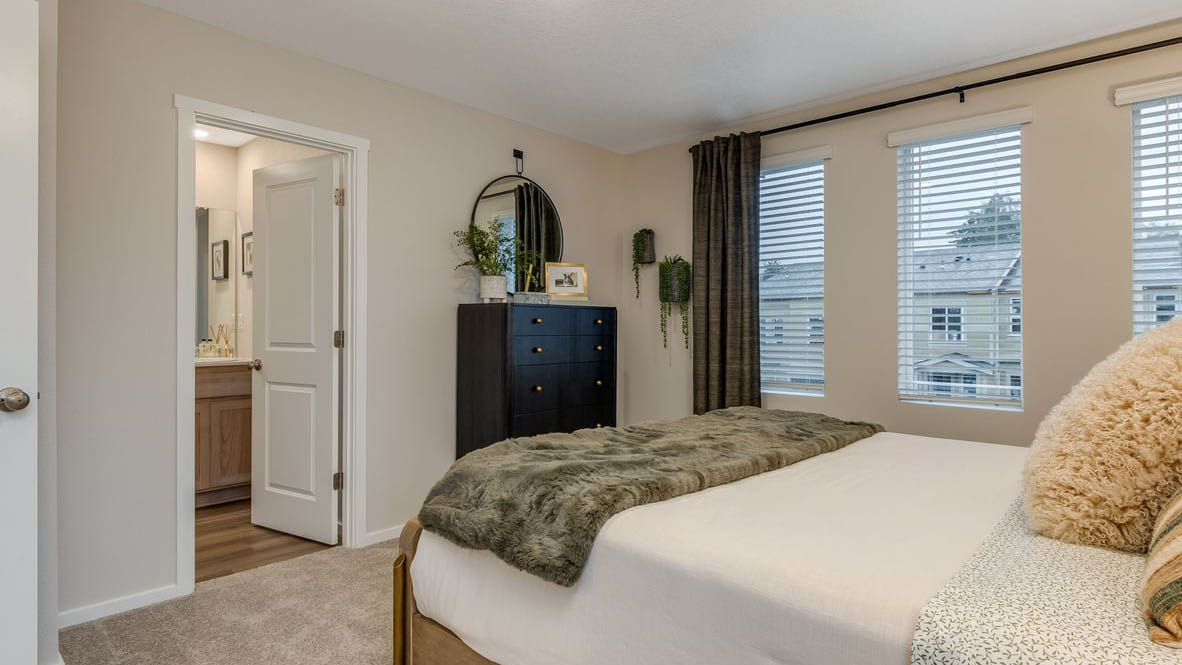 Blue Pearl Bedroom with a bed and window