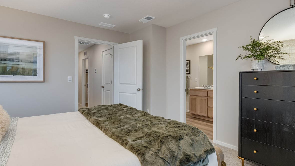 Blue Pearl Bedroom with a bed and window