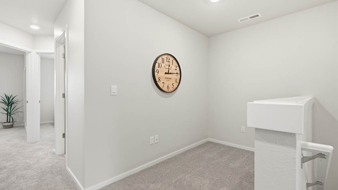 Thunder Ridge loft with carpet and white walls