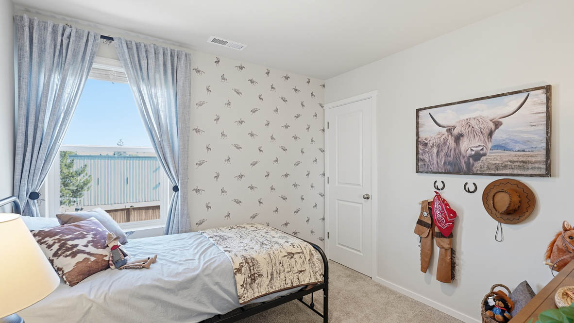 Thunder bedroom with accents with carpeting and a walk in closet