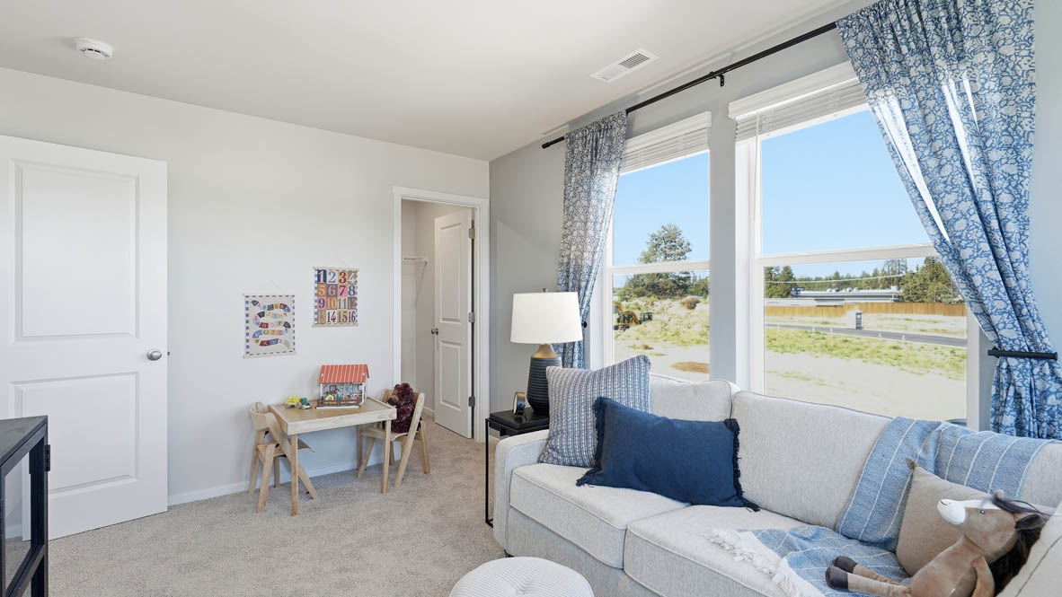 Thunder Ridge bedroom with accents with carpeting and a walk in closet