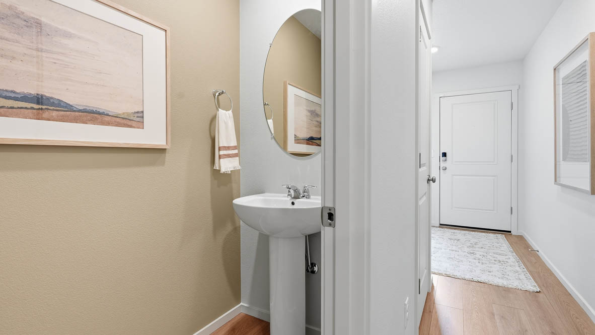 Thunder Ridge powder room with sink and mirror