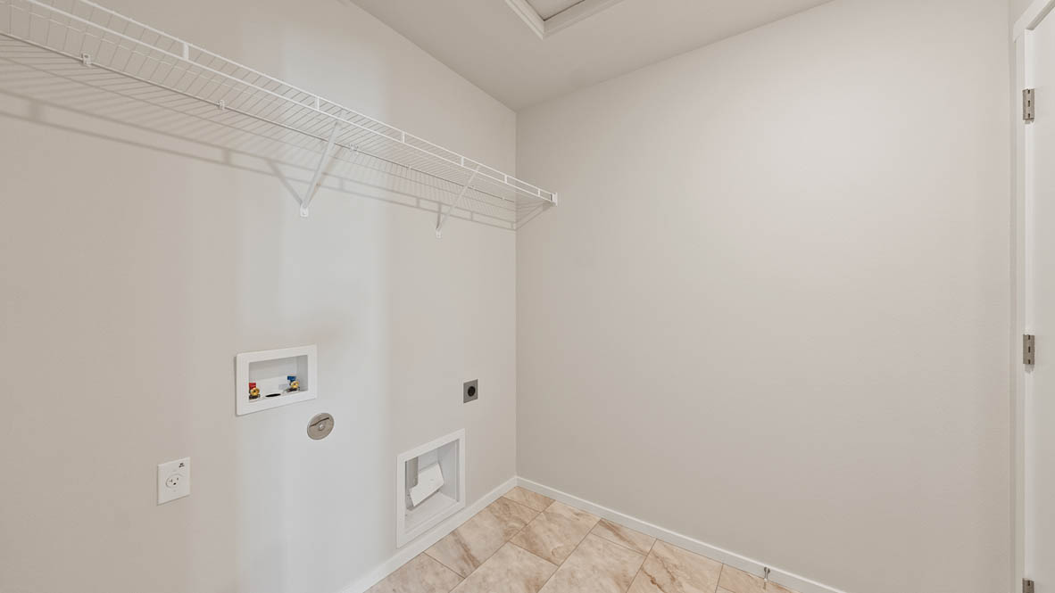 Ponderosa laundry room with white wire shelving