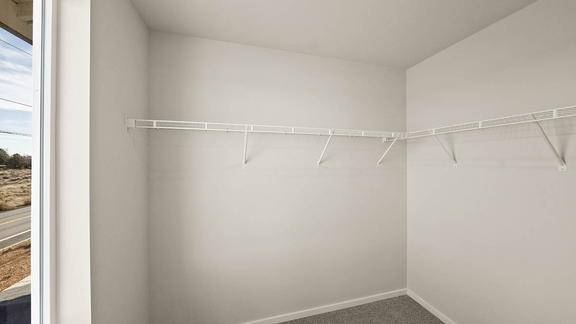 Ponderosa walk in closet with white wire shelving