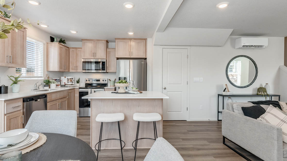 Ponderosa Dining room with a table and four chairs, with island, stainless steel appliances, dining table, quartz countertops, a cabinets