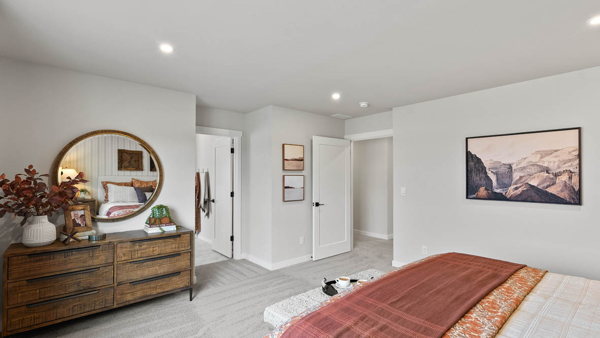 Stevens Ranch Diamond 3816 bedroom with carpet flooring and window