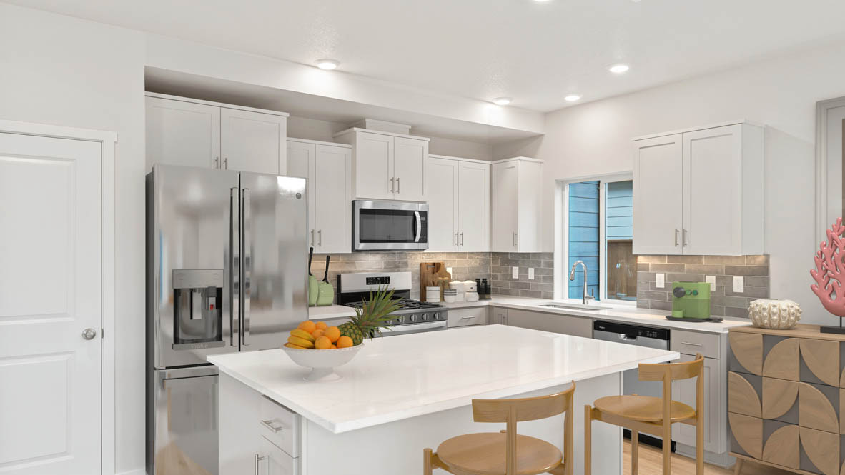 Stevens Ranch Diamond 3816 kitchen with white cabinets and stainless-steel appliances