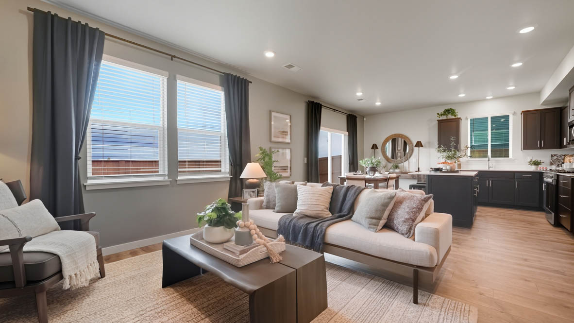 Stevens Ranch with hardwood flooring, fireplace, accent wall, l sectional couch, coffee table