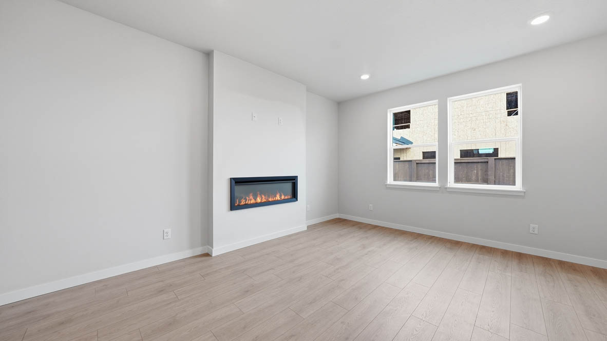 Stevens Ranch Great room with white walls, windows