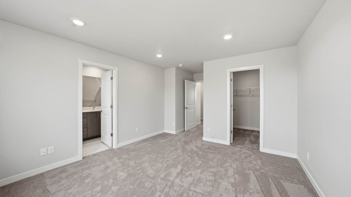 Stevens Ranch bedroom with carpet and closet