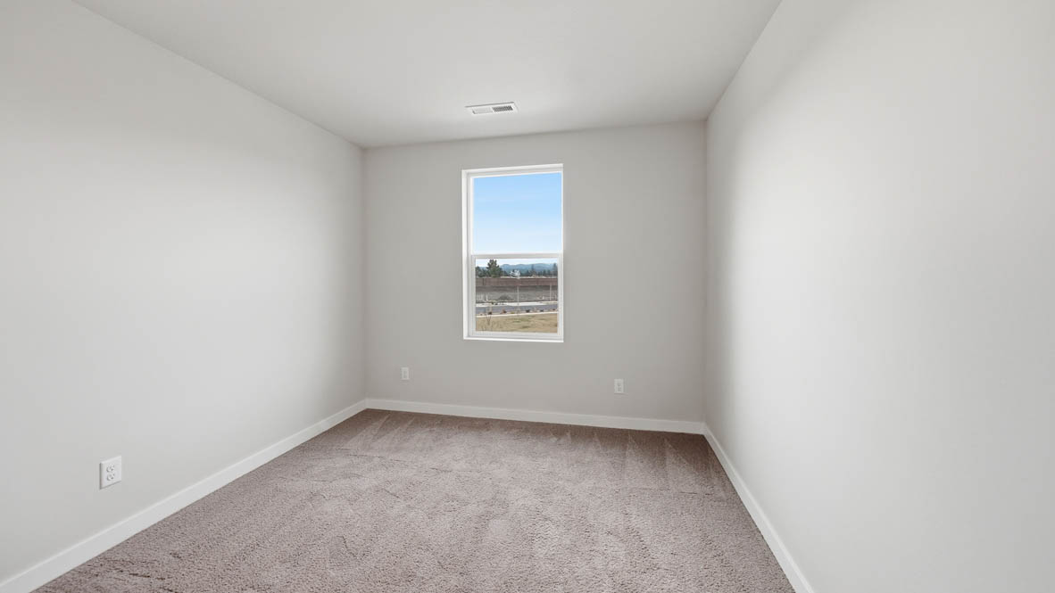 Stevens Ranch bedroom with carpet and a window