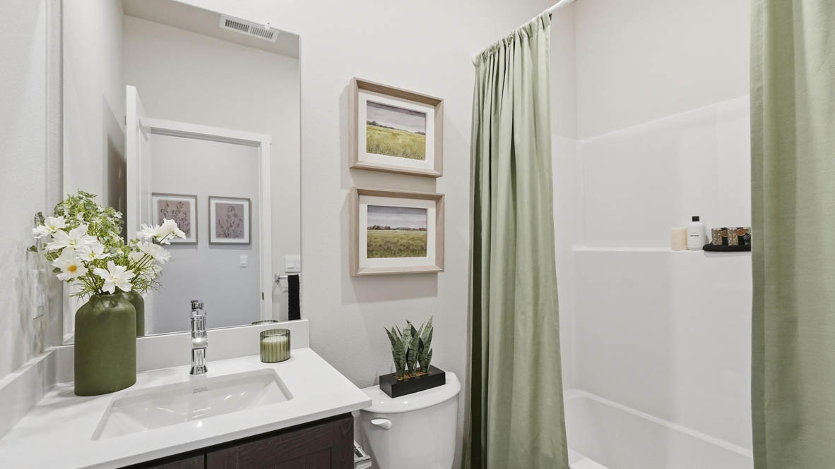 Stevens Ranch bathroom with cabinets and countertops