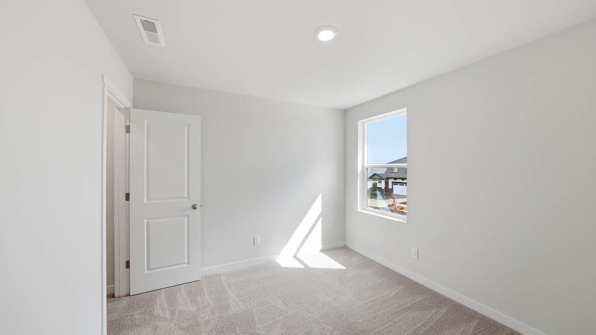 Stevens Ranch bedroom with carpet and a window