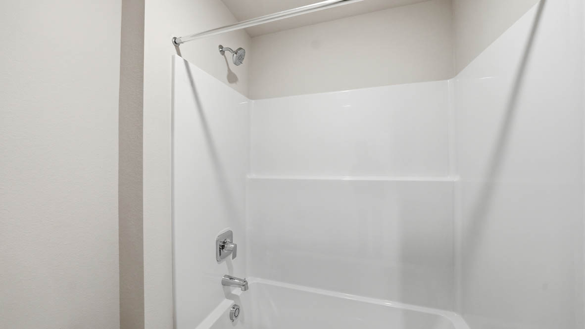 Stevens Ranch secondary bathroom with walk in shower tub