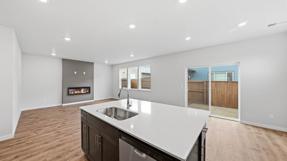 Stevens Ranch Kitchen with appliances. with white walls, windows