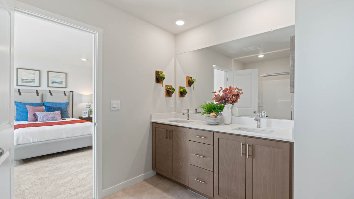 Stevens Ranch bathroom with white walls, quartz countertops, cabinets
