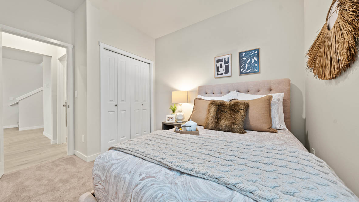 Stevens Ranch bedroom with bed, window, carpet, mirror, dresser, and night stand