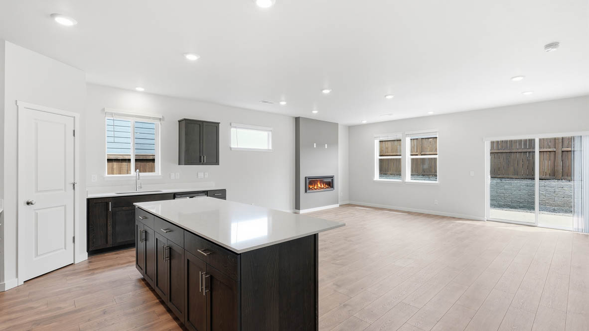 Stevens Ranch kitchen with brown stained cabinets and island